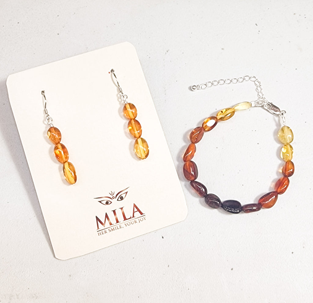 Natural Baltic Amber in graduating hues, created into a set of bracelet and earrings