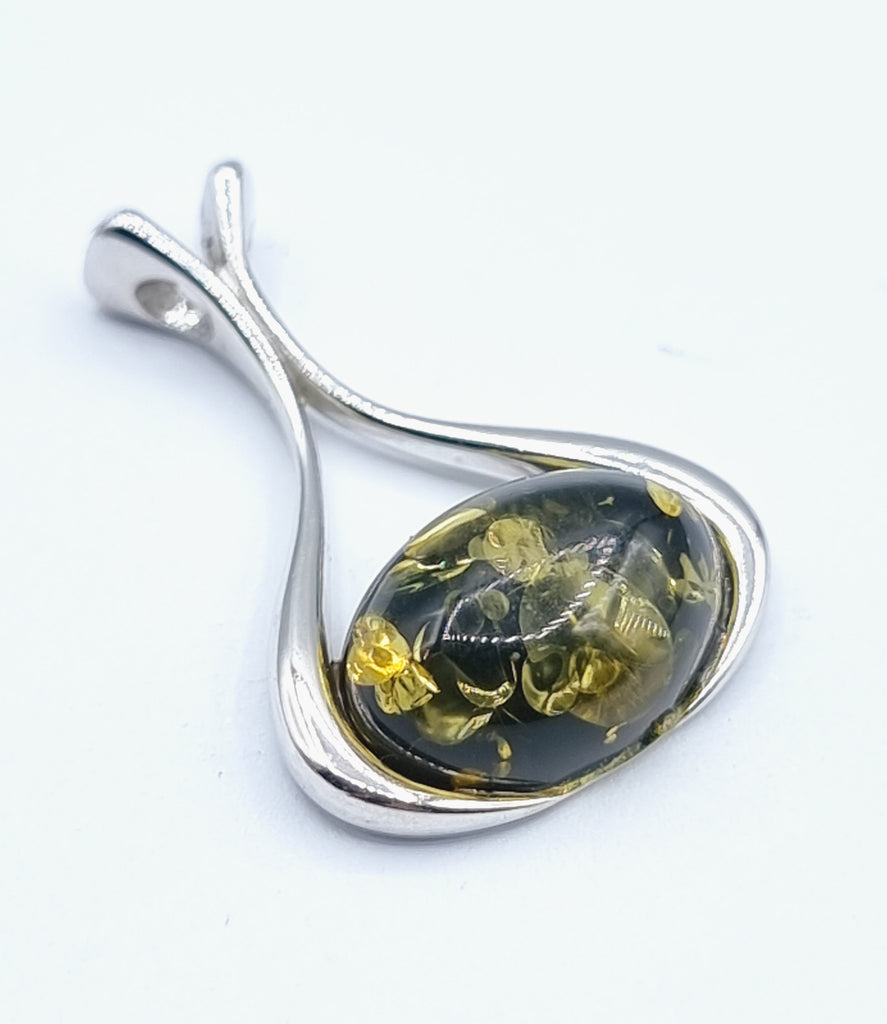 Horizontal green natural Baltic Amber cabochon set on elegant hollow Sterling Silver swirl pendant