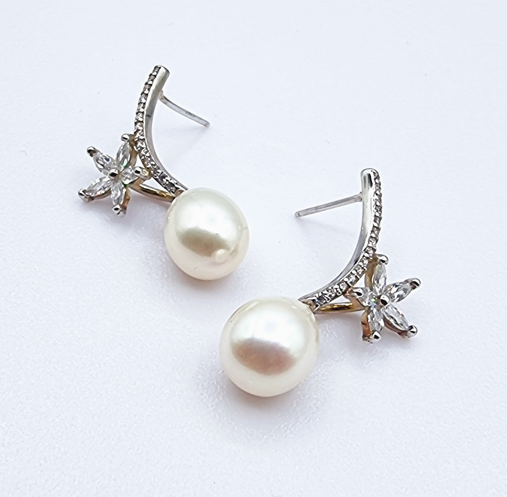 White lustrous high grade freshwater pearl on zircon set sterling silver stud with a beautiful side flower