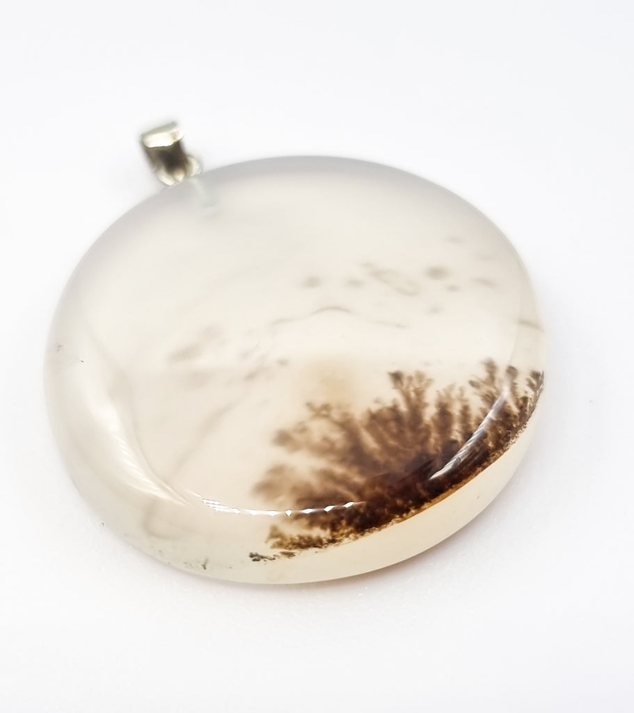 A beautiful large round natural Dendritic Landscape Agate pendant with a 925 Sterling Silver bail. A stunning creation of Mother Nature, depicting the inclusions as a bunch of herbs. Truly a piece of art!