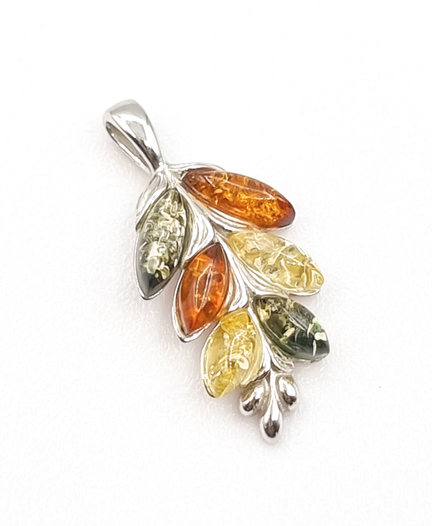 Shaped like a beautiful vine drop, this captivating pendant is crafted on 925 sterling silver with natural Baltic Amber in shades of cognac, light yellow and green. Origin Poland