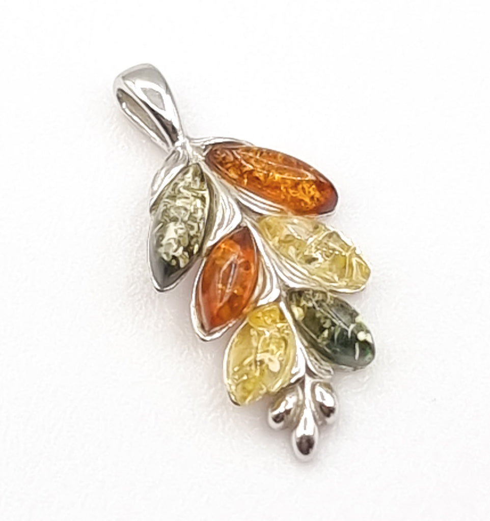 Shaped like a beautiful vine drop, this captivating pendant is crafted on 925 sterling silver with natural Baltic Amber in shades of cognac, light yellow and green. Origin Poland