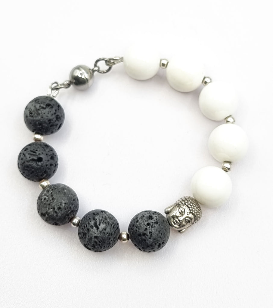 Discover harmony and spiritual connection with this Yin Yang bracelet featuring a serene Buddha accent, perfect for both men and women. Elevate your style and find inner peace with this beautifully handcrafted unisex bracelet. 