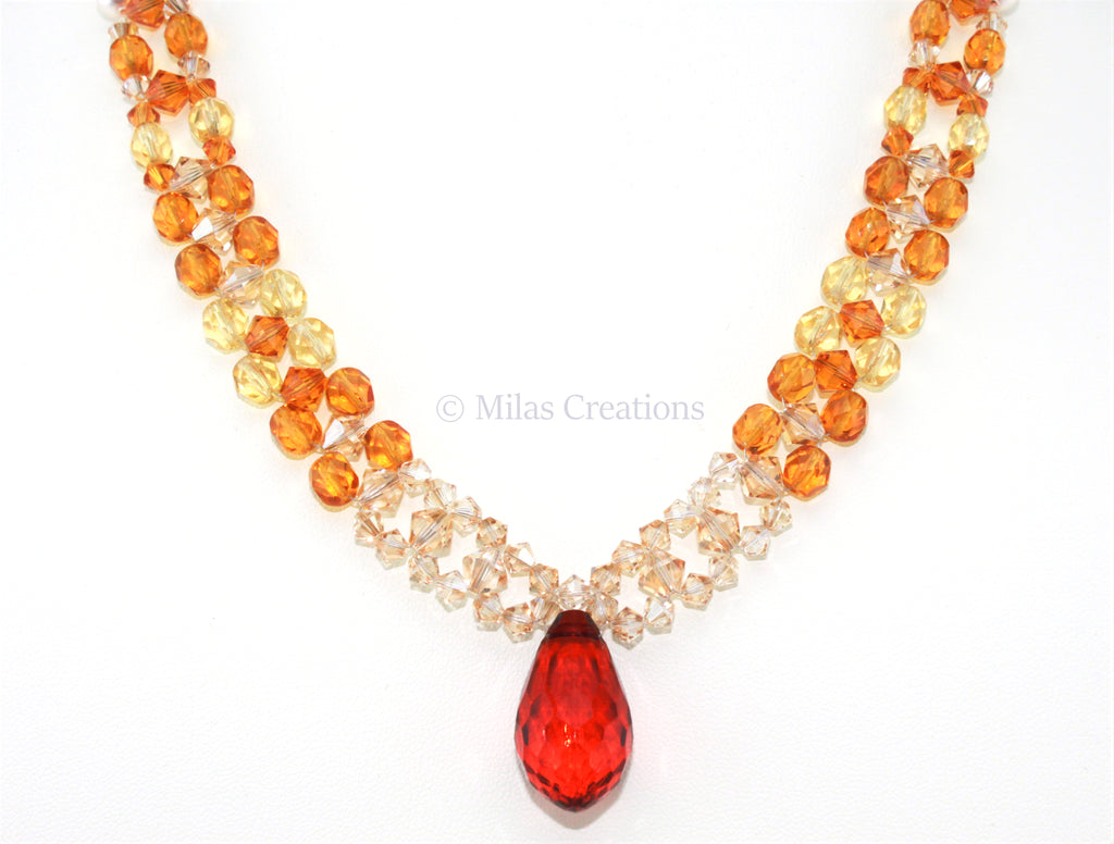 Hand woven  Choker length Necklace, Swarovski crystals and pearls, faceted glass, amber tone acrylic teardrop