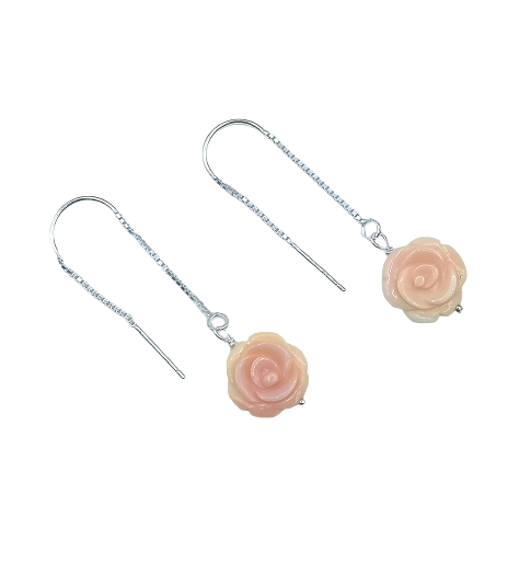 A pair of earrings designed and handmade with beautifully carved Natural Pink Coral Roses on Sterling Silver 'Thread and Needle' earring hooks