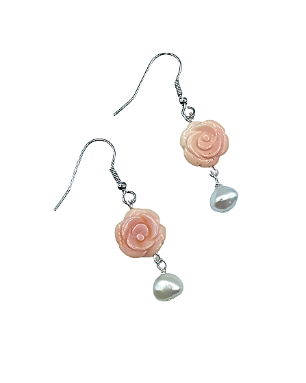 A pair of beautiful earrings handmade with natural pink Coral carved into a beautiful rose with drops of white lustrous Freshwater Baroque Pearls. 