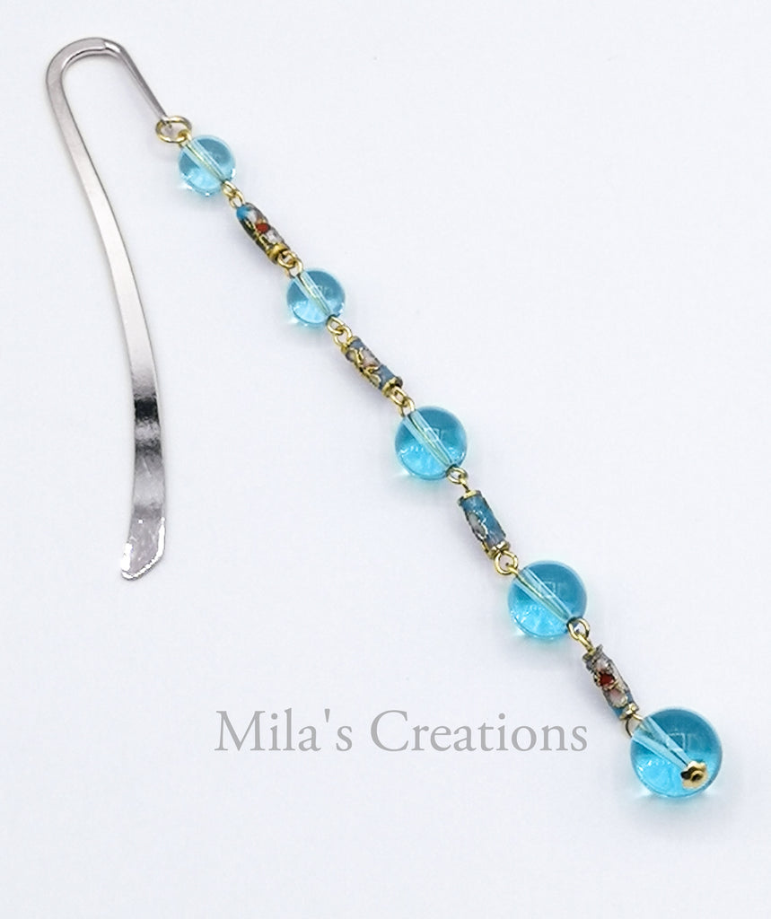 A beautiful bookmark for avid readers!  Handmade on Stainless steel bookmark, designed with handmade glass beads and brass Cloisonne