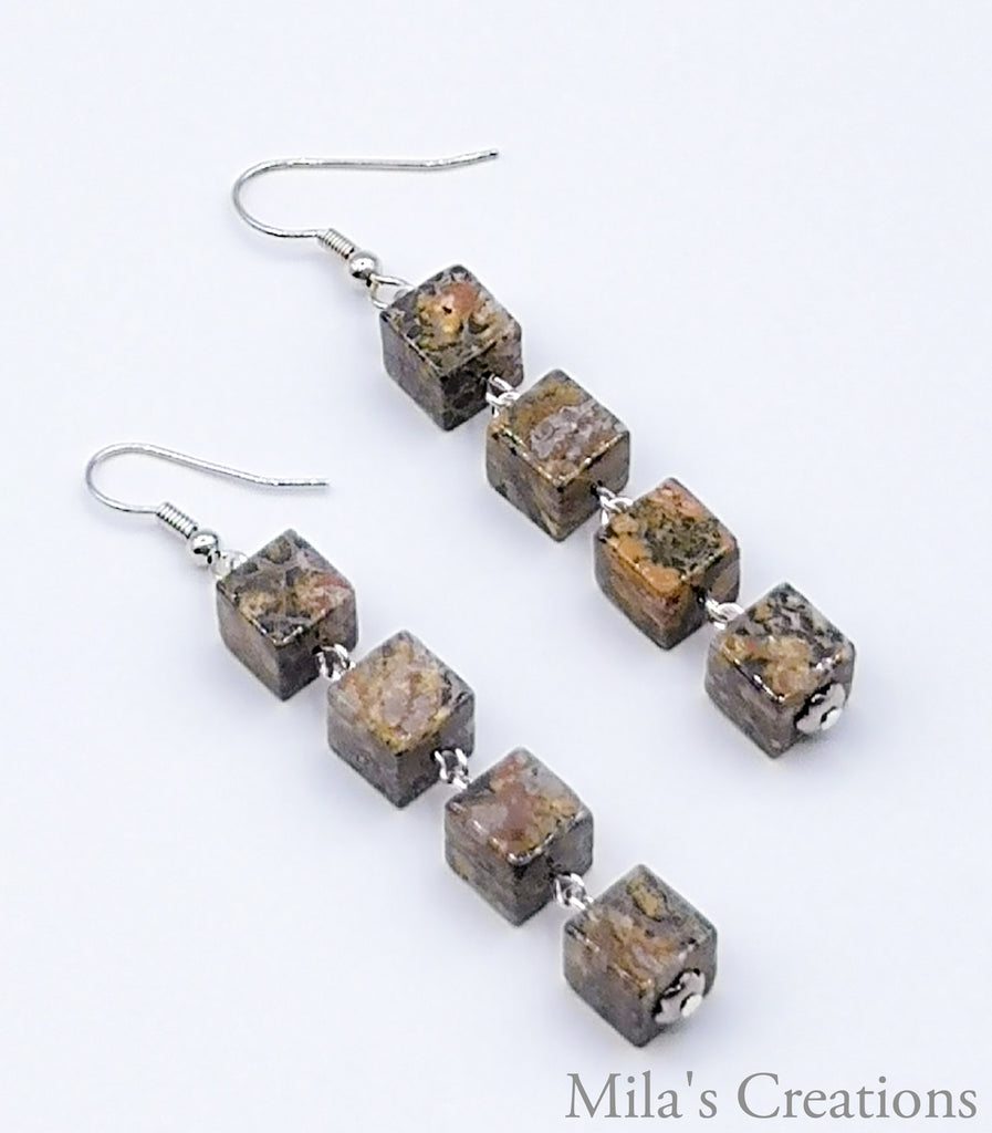 A pair of handmade dangling earrings designed with beautiful cubed Leopard Skin Jaspers with Silver-plated earring hook