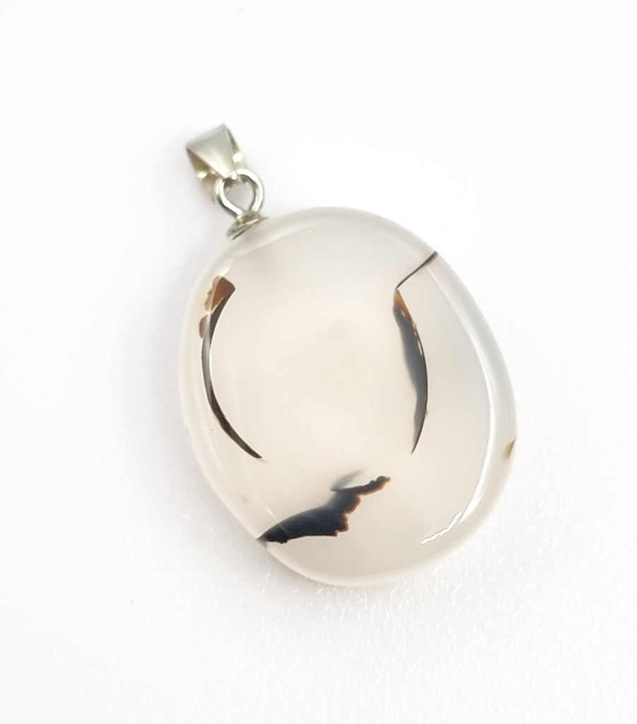 A small natural Dendritic Landscape Agate pendant, with elegant curve inclusions. Set with a 925 Sterling Silver bail, this pendant is truly beautiful